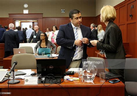 George Zimmerman Speaks With Attorney Lorna Truett During Day 13 Of