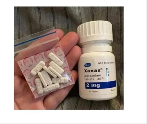 xanax blue football pills  mg  bottle alprazolam tablets