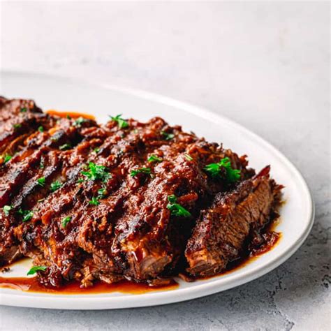 Easy Braised Beef Brisket (How to Cook Tender Brisket in the Oven) - Posh Journal