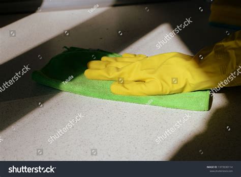 Hand Yellow Rubber Glove Washing Surface Stock Photo 1373930114