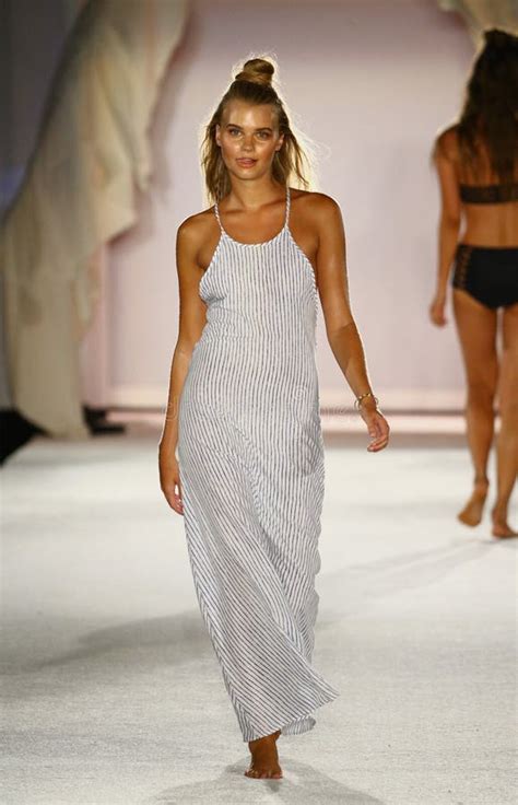 A Model Walks Runway In Designer Swim Apparel During The Frankies