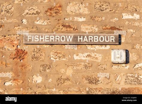 Fisherrow Harbour Sign On The Harbourmasters Office Building