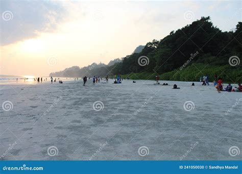 Tourists Relaxing And Enjoying The Sunset At Radhanagar Beach Havelock