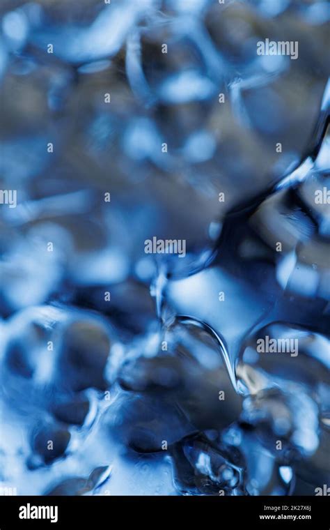 Melting ice water closeup Stock Photo - Alamy