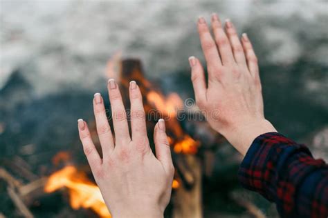 Man Warms His Hands Over Forever Burning Fire Of Mount Chimaera In