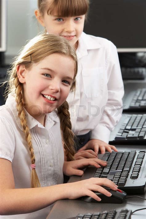 Girls Using Computers In School Class Stock Image Colourbox