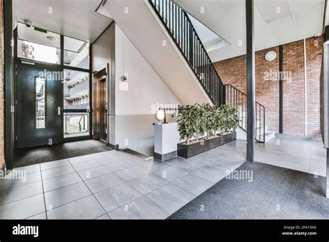 Hallway of modern apartment building Stock Photo - Alamy