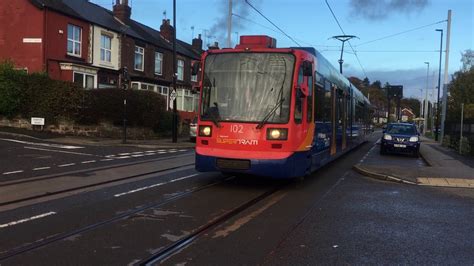 Sheffield Supertram 102 Heads Down Middlewood Road With A Yellow Route