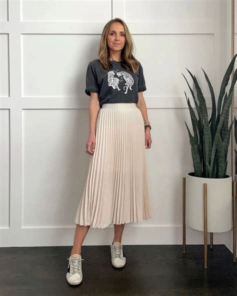 4 Ways To Wear Sneakers With Skirts Merrick S Art Pleated Skirt With