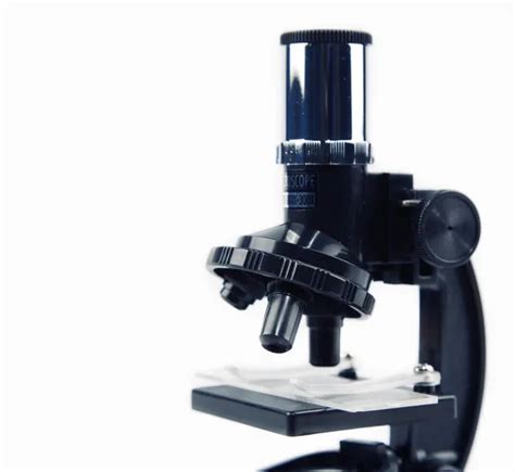 Laboratory microscope lens Stock Photo by ©Alex011973 31409225