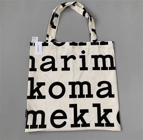 Esitellä 101 imagen marimekko logokassi musta Abzlocal mx