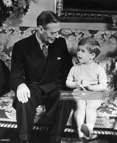 King George VI with Prince Charles on his third birthday. | George vi ...