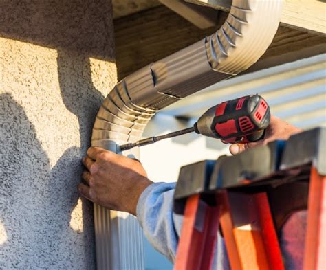 Mastering Commercial Downspout Installation – Gutter Pros