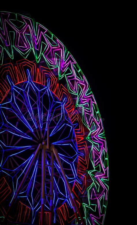 The Ferris Wheel at Night is Full of Colorful Lights Stock Photo ...