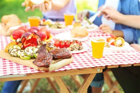 Family Having Picnic on Summer Day, Closeup Stock Image - Image of meat, mother: 151186307