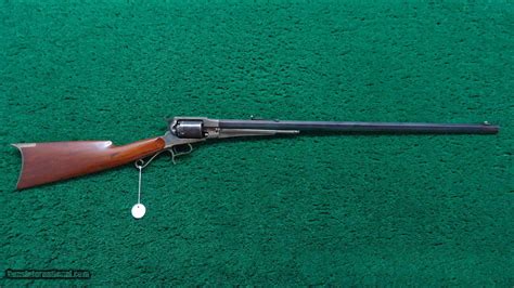 REMINGTON REVOLVING RIFLE CONVERTED TO CARTRIDGE IN .38 CALIBER RIMFIRE