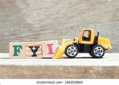 Toy Bulldozer Hold Letter Block Complete Stock Photo