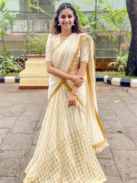 Keerthy Suresh Visits Guruvayur In A Kasavu Half Saree By Pranaah