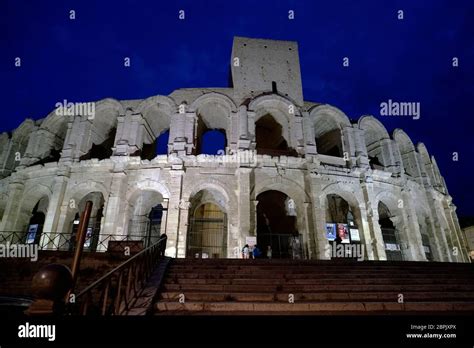 The night view Arles Amphitheatre with medieval tower.Arles.Bouches-du ...