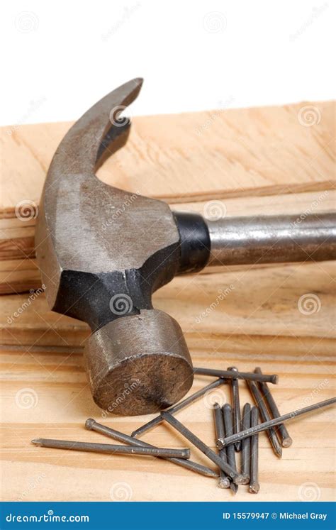 Isolated hammer and nails stock image. Image of pine - 15579947