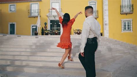 Passionate Hispanic Couple Dancing Hot Choreography Latin Style On Street Stairs Stock Image