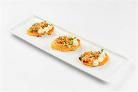 Appetizer Sandwiches on a White Plate on a White Background. Catering ...