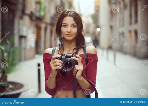 Beautiful Tourist Woman With Digital Camera Outdoor In City Street