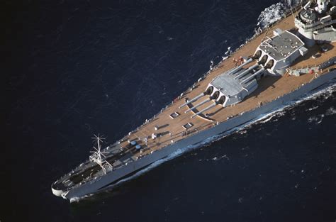 An Aerial Port View Of The Forward Half Of The Battleship Uss Missouri Bb 63 While The Ship Is