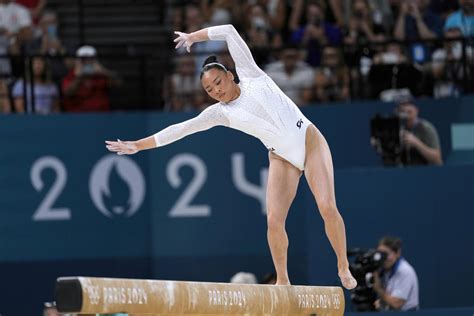 It was oddly quiet at the Olympics balance beam final, and Simone Biles says the gymnasts ...