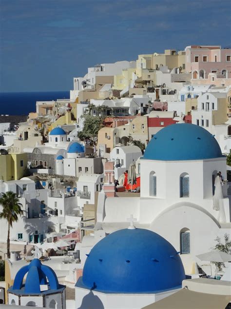 Three Blue Domes Of Oia Photo