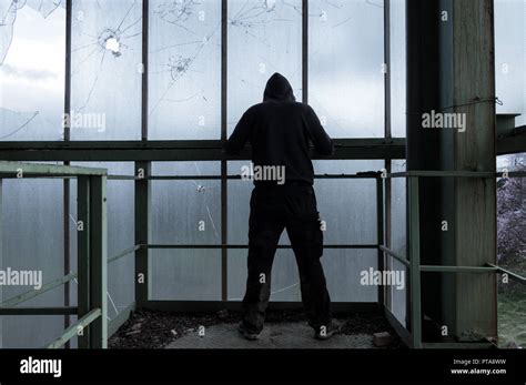 Hooded Figure Silhouette Stock Photos & Hooded Figure Silhouette Stock ...