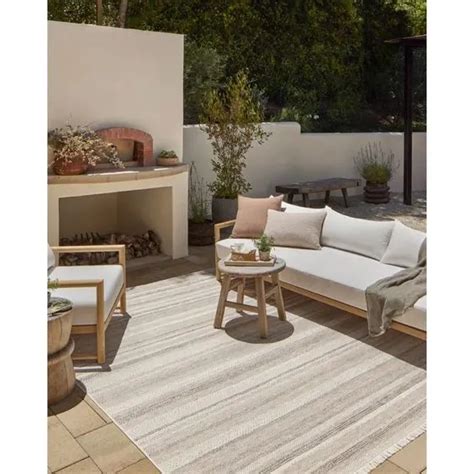 Top 12 Outdoor Rugs to Elevate Your Patio This Summer