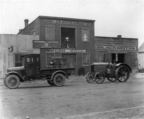 Truck And Tractor In Front Of International Harvester Dealership