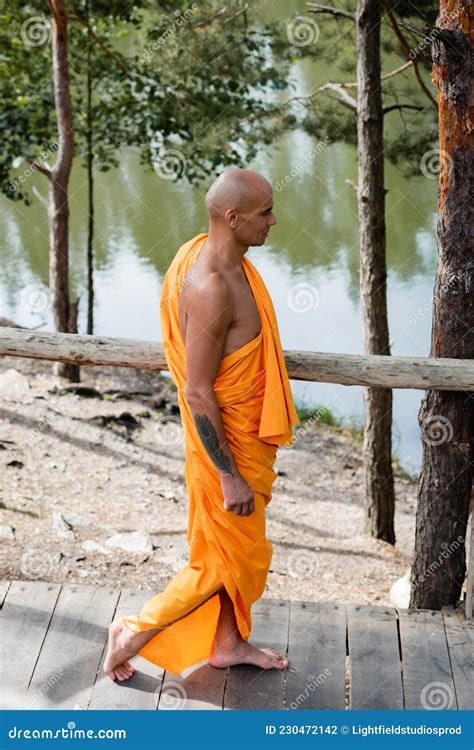 Side View Of Buddhist Monk Walking Stock Photo Image Of Eastern