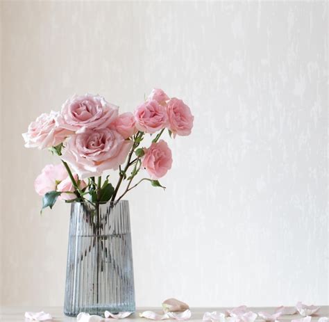 Premium Photo Still Life With Pink Roses In Glass Vase