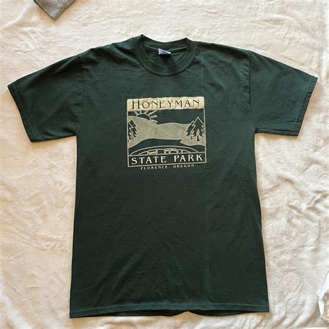 Men’s size medium green graphic T-shirt There is a... - Depop