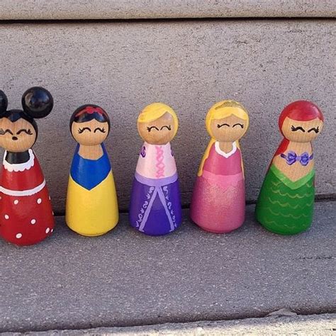 Set Of 4 Disney Inspired Princess Peg Dolls You Choose Disney Disney Inspired And Rapunzel