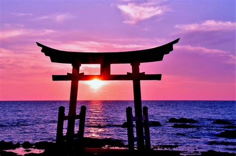 Rising Up From The Ocean The Red Torii Gate Of The Toyosaki Konpira