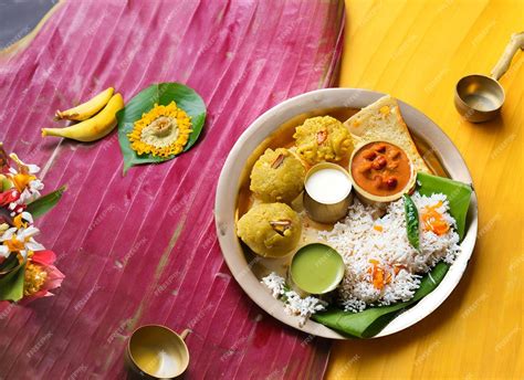 Premium Photo Onam Feast Eating Onasadya In Banana Leaf During The