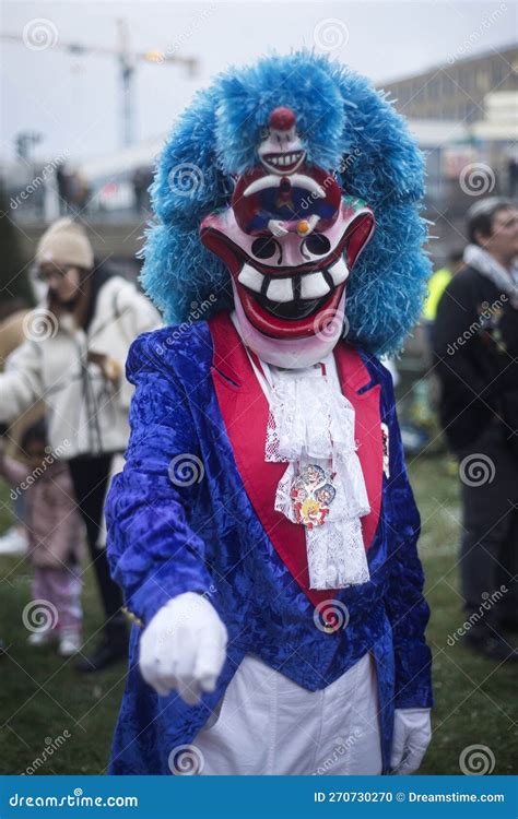 Portrait Of Masked People Parading In The Street Editorial Image