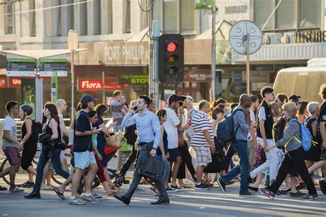 People Walking Across A Busy Crosswalk Editorial Photography Image Of Walk Lens 64505477