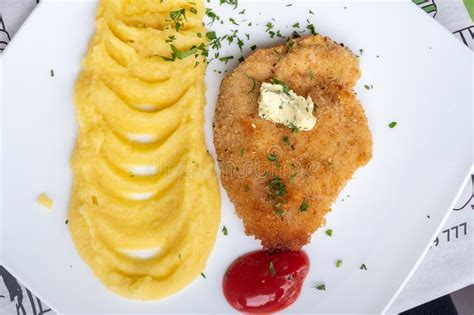 Fried Chicken Fillet In Batter With Sauce And Mashed Potatoes Top View