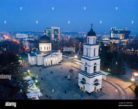 Aerial Drone View Of Chisinau City Center At Night With Lights And Blue