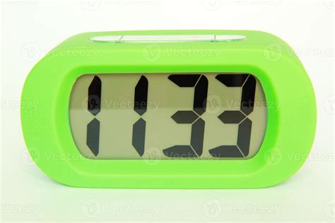 green clock isolated  white background  stock photo  vecteezy