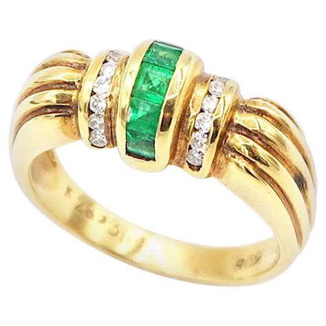 18 Karat Yellow Gold Emerald and Diamond Ring For Sale at 1stDibs