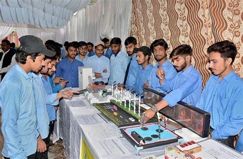 Students Visiting Various Stalls Science Projects During An Exhibition