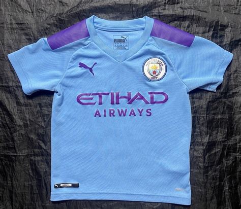 MANCHESTER CITY Oryginalna Domowa Koszulka PUMA Dla Dziecka 118cm 5 6