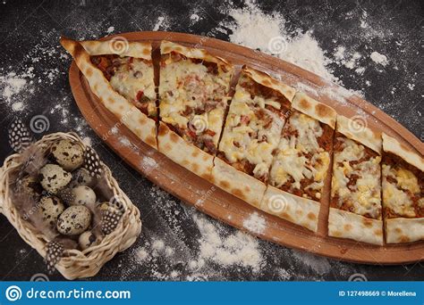 Turkish Pizza Is Called Peed Topped With Baked Cheese Next To Quail Eggs Stock Image Image