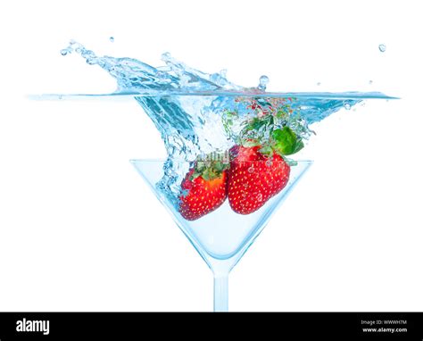 Fresh Strawberry Dropped Into Glass With Splash Stock Photo Alamy