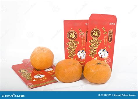 Mandarin Oranges And Chinese New Year Red Packet Stock Photos - Image ...